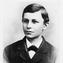 Black and white portrait of a young man.