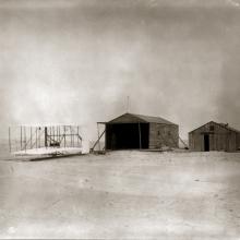 Wilbur Wright with 1903 Flyer