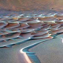 A area of rippling sand dune formations on Mars.