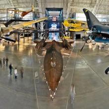 A view of several aircraft inside a section of the Udvar-Hazy Center, which is a large hangar full of aircraft.