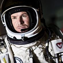 Felix Baumgartner, a white man, wearing a high-altitude flight suit.