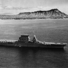 The Lexington lies at anchor off Diamond Head