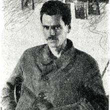 Yuri Vasilievich Kondratyuk, a white male physicist, poses informally.