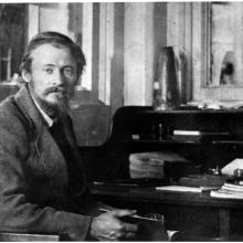 Friedrich Tsander, a white male physicist, sits near a desk.