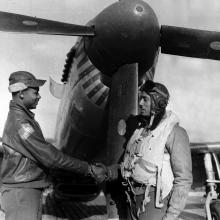 Wendell O. Pruit Greets John F. Briggs