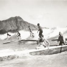 Outrigger Canoe and Surfers