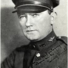 Lowell Smith, a man, poses for a portrait in U.S. Army Air Service uniform.