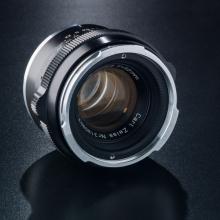 Single black camera lens.