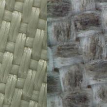 Close-up view comparing the yellow, tan brown, small weaved fabric on a Russian cosmonaut's glove versus the larger weaved fabric on the glove of a U.S. astronaut. The U.S. glove has lunar dust on the fabric.