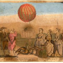 An art print of people, including the King and Queen of England, observing a balloon lifting off at a castle.