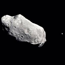 Photo of an asteroid and its satellite moon.