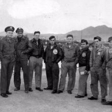 A group of U.S. Air Force soldiers who fought during World War II stand together.