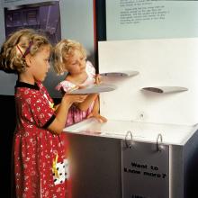 Two curious youngsters learn about wing shapes