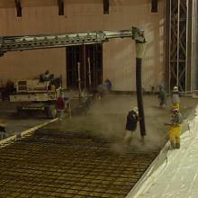 Preparing the floor of the Aviation Hangar