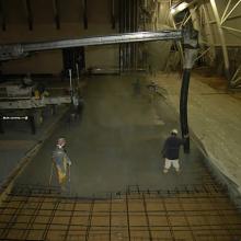 Preparing the floor of the Aviation Hangar