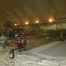 Preparing the floor of the Aviation Hangar