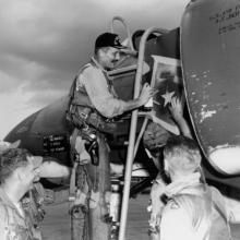 Brig. Gen. Robin Olds Paints Star on Aircraft