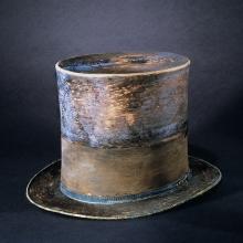 Top hat with aging fabric