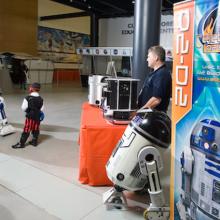 Kids Enjoy an Encounter with R2D2 at Air & Scare