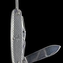 Metal, multi-component pocket knife included in astronaut survival kit