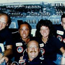 The five crew members of STS-7 pose for a photo on board Space Shuttle Challenger