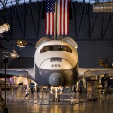 Front-facing view of the Space Shuttle Enterprise, with a focus on the nose and cockpit