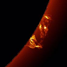 Focus on solar prominences of plasma floating away from the Sun.