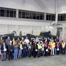 Staff & Supporters Pose in Front of <i>Helldiver</i>