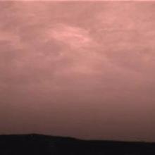 Pink stratus clouds in the atmosphere of Mars.