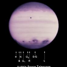 Hubble Ultraviolet Image of Comet P/Shoemaker-Levy 9 Impacts on Jupiter