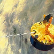 An artist's depiction of a cylinder-shaped orbiter with a satellite and multiple antennae orbiting over Venus.