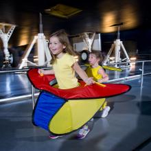 Child with an airplane costume