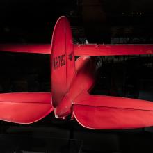 Tail of red Amelia Earhart Lockheed Vega 5B aircraft