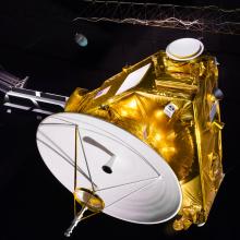 Bottom of New Horizons Spacecraft Mock-up Model hanging in museum