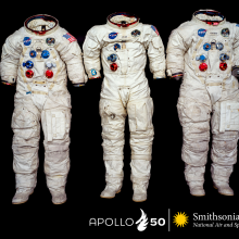 three white Apollo spacesuits