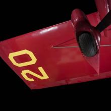 Yellow "20" on underwing and wheel of red Wittman Special 20 "Buster" aircraft