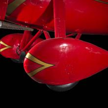 Red teardrop shaped wheel faring on Amelia Earhart Lockheed Vega 5B aircraft