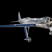 Metalic silver and blue Hughes H-1 Racer aircraft