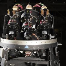 Three camera lenses on top portion of black Ranger spacecraft