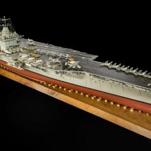 USS Enterprise Aircraft Carrier Model on wooden display stand