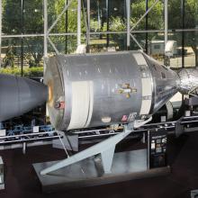 Metal conical command module with cylindrical module in museum