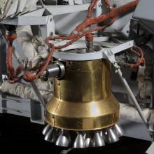 Bell-shaped engine with copper colored wiring on Viking Mars Lander