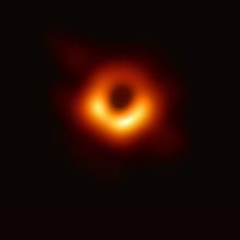 An orange ring against a black background. 