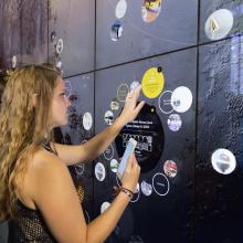 Visitor using the Interactive Wall in the Boeing Milestones of Flight Hall