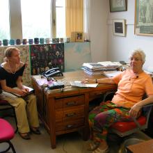 Vera Rubin is seated in her office with intern Ashley Yeager