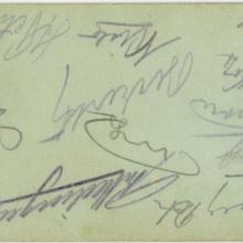 Autographs on back of card