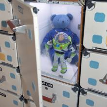 Buzz Lightyear and Magellan T. Bear in <i>Moving Beyond Earth</i>