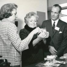 Rita Rapp explains a rehydratable food package to visitors. 