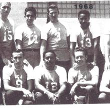 posed photo of men in sotfball uniforms