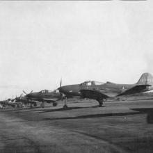 Bell P-39 Airacobras passing through Wideawake Field